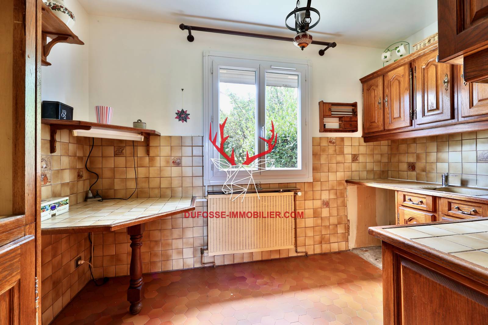 Cuisine aménagée et meublée