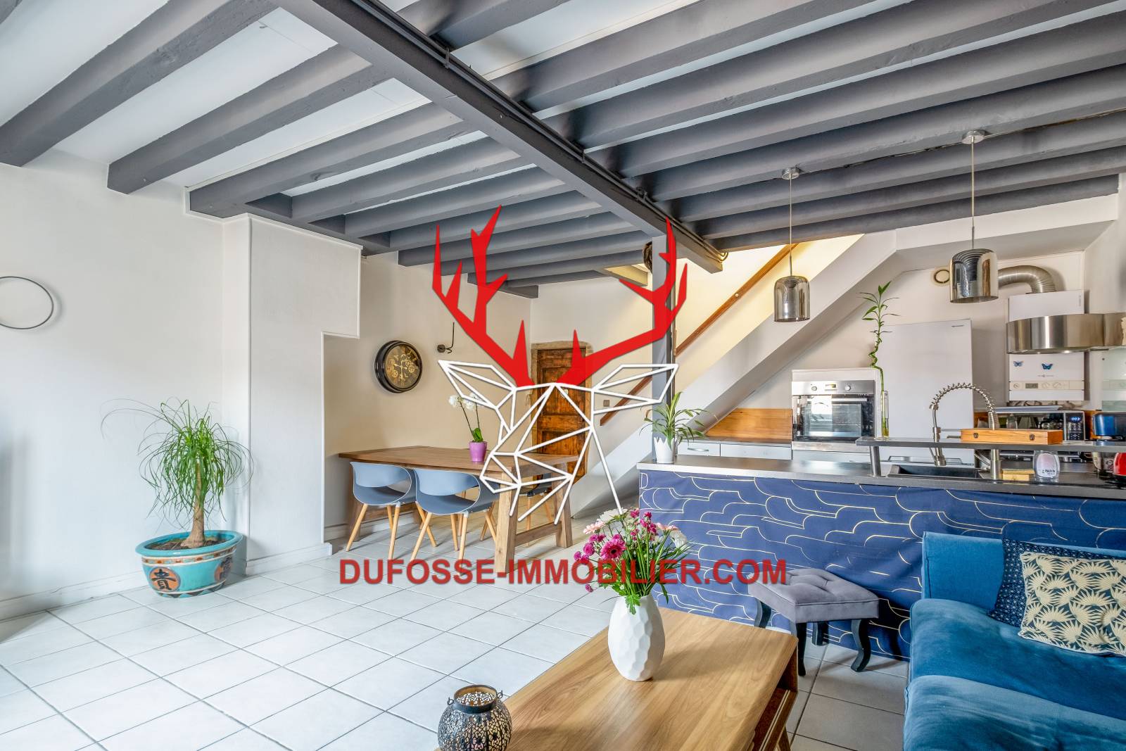 Triplex avec grande pièce de vie