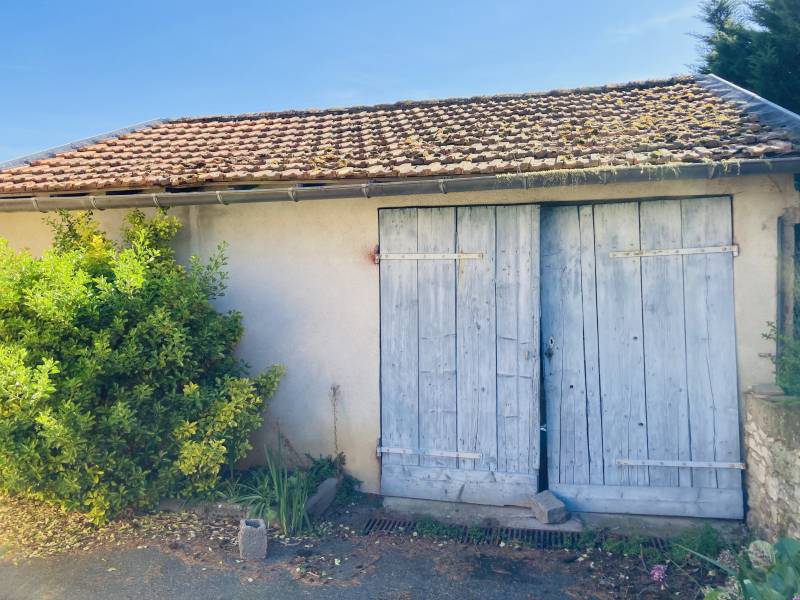 Au calme, maison T4 à rénover avec garage, cave, bureau avec jardin clos - parcelle constructible