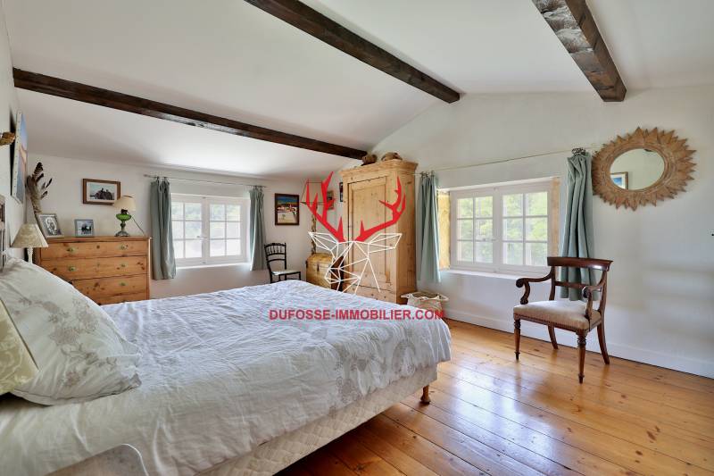 Etage : Chambre 5 de 21 m² - Parquet au sol.
