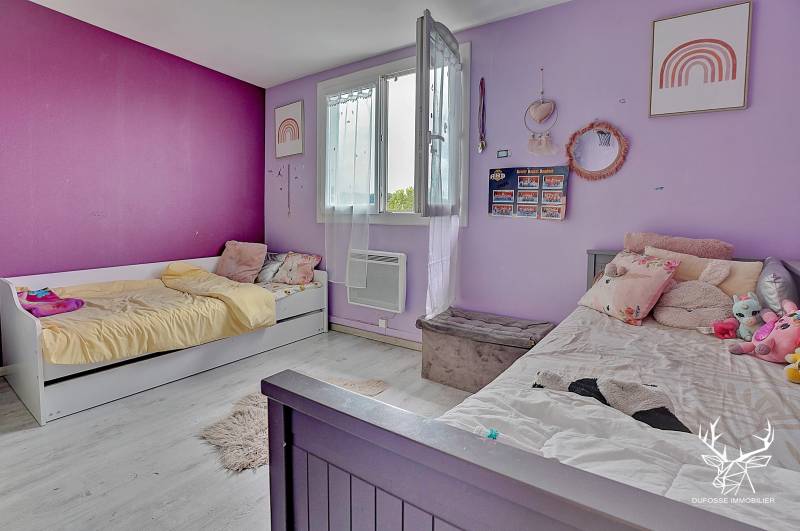 Maison familiale avec jardin , à deux pas du centre de Saint Quentin fallavier